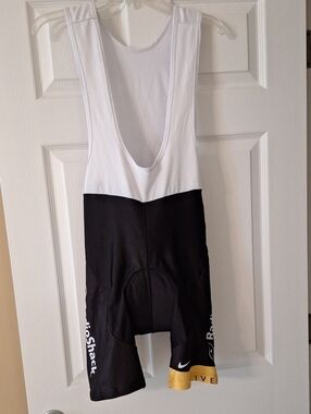 Black and White Cycling Bib Shorts with Gold Accent